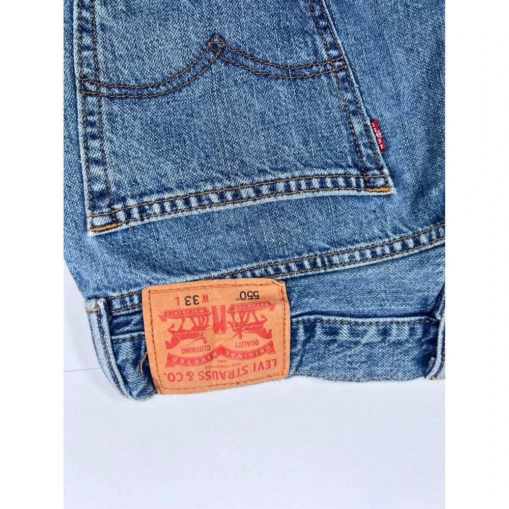 Levi's 550 Relaxed Fit Shorts Men 33 Blue Medium Wash Cut Off Raw Hem Denim